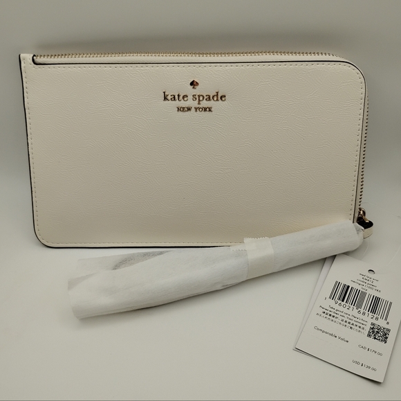 kate spade Handbags - Kate Spade New York Staci Medium Leather Zip Wristlet in pale sapphirine